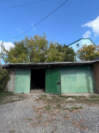 Продам 2 спарині гаражі р.Військове містечко - фото 1